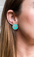 Aretes redondos verde menta con estrella de mar dorada