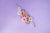 Pulsera flores de piedras rosa y gris con perlas