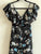 Jumpsuit Negro con flores azules, blancas y rosa pastel