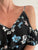 Jumpsuit Negro con flores azules, blancas y rosa pastel