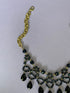 Collar dorado, 7 gotas de cristal negro