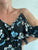 Jumpsuit Negro con flores azules, blancas y rosa pastel